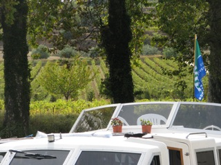 Our boat below the vineyards