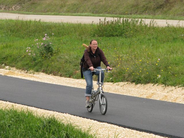 Karen returning from a successful baguette hunt