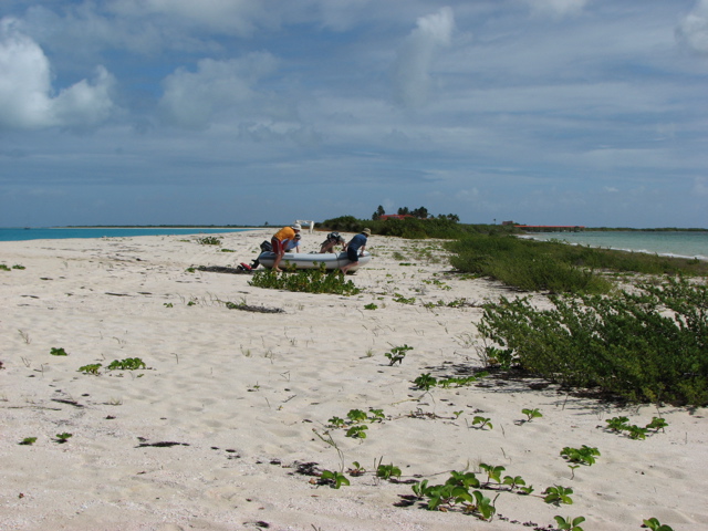 Crossing the beach to Codrington Lagoon (T)