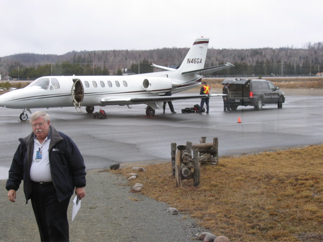 Transferring the luggage to the Escalade...